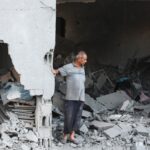 Israel strikes family homes as it pressures Palestinians to flee to south Gaza