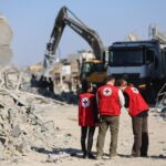 Hamas hands over remains of captive as Israeli drone strike kills two